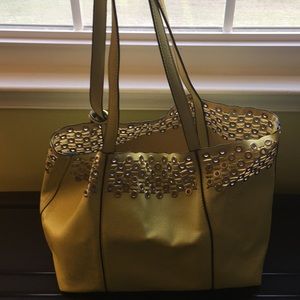 Green purse with coin purse and cross body purse.